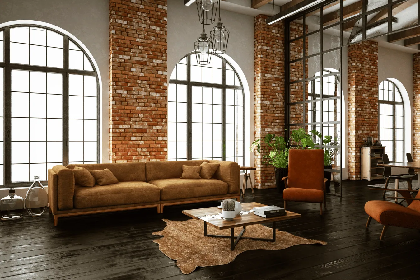 Beautifully converted loft space with exposed brick walls and modern furniture